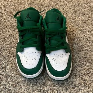 Green, black and white Jordan’s